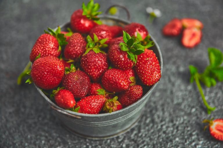Strawberries in grey bowl. Fresh strawberries. Beautiful strawberries.